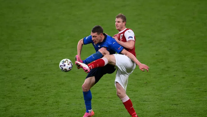 LONDON, ENGLAND - JUNE 26: Andrea Belotti of Italy is challenged by Martin Hinteregger of Austria during the UEFA Euro 2020 Championship Round of 16 match between Italy and Austria at Wembley Stadium at Wembley Stadium on June 26, 2021 in London, England. (Photo by Laurence Griffiths/Getty Images)