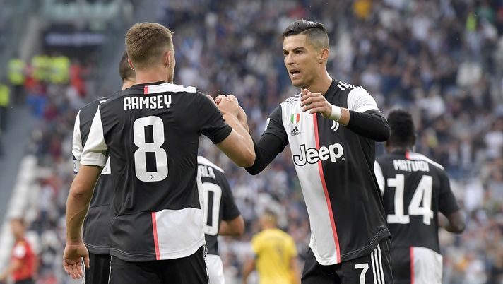 TURIN, ITALY - SEPTEMBER 21: Aaron Ramsey of Juventus celebrates after scoring goal of 1-1 with teammate Cristiano Ronaldo during the Serie A match between Juventus and Hellas Verona at Allianz Stadium on September 21, 2019 in Turin, Italy. (Photo by Daniele Badolato - Juventus FC/Juventus FC via Getty Images) TURIN, ITALY - SEPTEMBER 21: Aaron Ramsey of Juventus celebrates after scoring goal of 1-1 with teammate Cristiano Ronaldo during the Serie A match between Juventus and Hellas Verona at Allianz Stadium on September 21, 2019 in Turin, Italy. (Photo by Daniele Badolato - Juventus FC/Juventus FC via Getty Images)