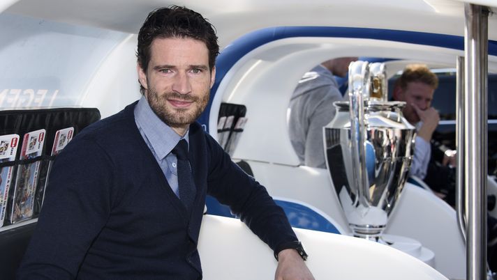 BERLIN, GERMANY - APRIL 29: Arne Friedrich poses in a bycicle cab called 'Velo-Taxi' next to the cup during the UEFA Champions League Trophy Tour Berlin on April 29, 2015 in Berlin, Germany.  (Photo by Clemens Bilan/Bongarts/Getty Images) 
