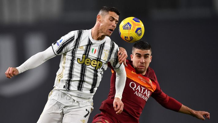 TURIN, ITALY - FEBRUARY 06: Cristiano Ronaldo of Juventus is challenged by Gianluca Mancini of A.S Roma during the Serie A match between Juventus and AS Roma at Allianz Stadium on February 06, 2021 in Turin, Italy. Sporting stadiums around Italy remain under strict restrictions due to the Coronavirus Pandemic as Government social distancing laws prohibit fans inside venues resulting in games being played behind closed doors. (Photo by Valerio Pennicino/Getty Images) TURIN, ITALY - FEBRUARY 06: Cristiano Ronaldo of Juventus is challenged by Gianluca Mancini of A.S Roma during the Serie A match between Juventus and AS Roma at Allianz Stadium on February 06, 2021 in Turin, Italy. Sporting stadiums around Italy remain under strict restrictions due to the Coronavirus Pandemic as Government social distancing laws prohibit fans inside venues resulting in games being played behind closed doors. (Photo by Valerio Pennicino/Getty Images)
