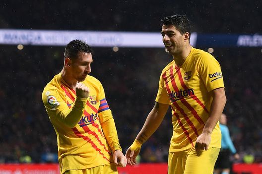 Messi Suarez (getty images) Messi Suarez (getty images)
