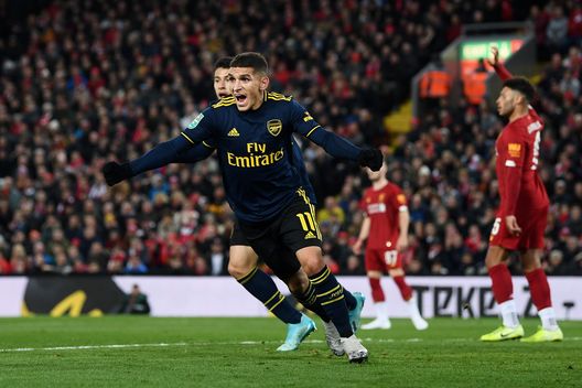  LIVERPOOL, ENGLAND - OCTOBER 30: Lucas Torreira of Arsenal celebrates after scoring his team's first goal during the Carabao Cup Round of 16 match between Liverpool and Arsenal at Anfield on October 30, 2019 in Liverpool, England. (Photo by Laurence Griffiths/Getty Images) 
