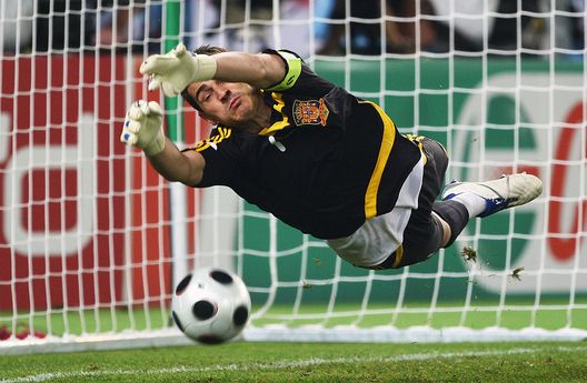 VIENNA, AUSTRIA - JUNE 22: Goalkeeper Iker Casillas of Spain saves a penalty during the UEFA EURO 2008 Quarter Final match between Spain and Italy at Ernst Happel Stadion on June 22, 2008 in Vienna, Austria. (Photo by Clive Mason/Getty Images) VIENNA, AUSTRIA - JUNE 22: Goalkeeper Iker Casillas of Spain saves a penalty during the UEFA EURO 2008 Quarter Final match between Spain and Italy at Ernst Happel Stadion on June 22, 2008 in Vienna, Austria. (Photo by Clive Mason/Getty Images)