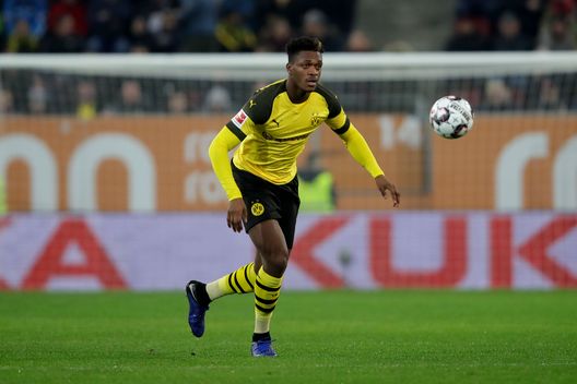 AUGSBURG, GERMANY - MARCH 01: Dan-Axel Zagadou of Dortmund runs with the ball during the Bundesliga match between FC Augsburg and Borussia Dortmund at WWK-Arena on March 01, 2019 in Augsburg, Germany. (Photo by Alexander Hassenstein/Bongarts/Getty Images) AUGSBURG, GERMANY - MARCH 01: Dan-Axel Zagadou of Dortmund runs with the ball during the Bundesliga match between FC Augsburg and Borussia Dortmund at WWK-Arena on March 01, 2019 in Augsburg, Germany. (Photo by Alexander Hassenstein/Bongarts/Getty Images)
