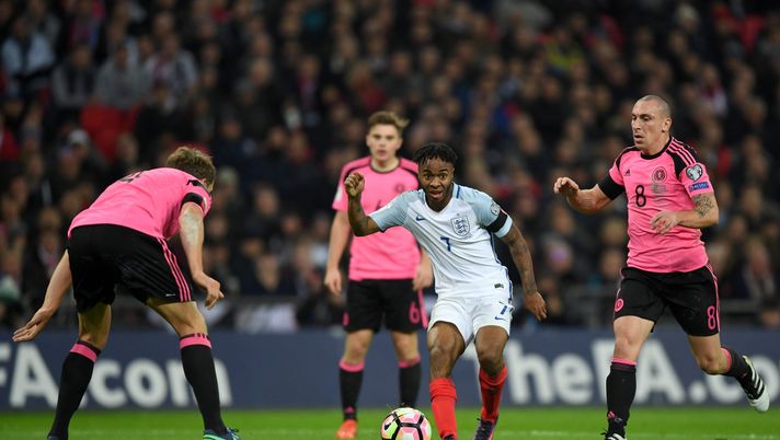 LONDON, ENGLAND - NOVEMBER 11: Raheem Sterling of England takes on the Scotland defence during the FIFA 2018 World Cup qualifying match between England and Scotland at Wembley Stadium on November 11, 2016 in London, England. (Photo by Shaun Botterill/Getty Images) LONDON, ENGLAND - NOVEMBER 11: Raheem Sterling of England takes on the Scotland defence during the FIFA 2018 World Cup qualifying match between England and Scotland at Wembley Stadium on November 11, 2016 in London, England. (Photo by Shaun Botterill/Getty Images)