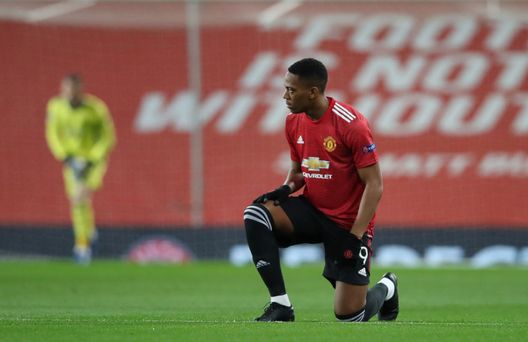 MANCHESTER, ENGLAND - OCTOBER 28: Anthony Martial of Manchester United takes a knee in support of the Black Lives Matter movement prior to the UEFA Champions League Group H stage match between Manchester United and RB Leipzig at Old Trafford on October 28, 2020 in Manchester, England. Sporting stadiums around the UK remain under strict restrictions due to the Coronavirus Pandemic as Government social distancing laws prohibit fans inside venues resulting in games being played behind closed doors. (Photo by Clive Brunskill/Getty Images) MANCHESTER, ENGLAND - OCTOBER 28: Anthony Martial of Manchester United takes a knee in support of the Black Lives Matter movement prior to the UEFA Champions League Group H stage match between Manchester United and RB Leipzig at Old Trafford on October 28, 2020 in Manchester, England. Sporting stadiums around the UK remain under strict restrictions due to the Coronavirus Pandemic as Government social distancing laws prohibit fans inside venues resulting in games being played behind closed doors. (Photo by Clive Brunskill/Getty Images)