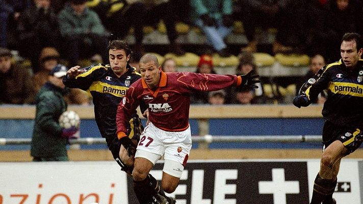 19 Dec 1999: Fabio Junior of Roma is tackled by Fabio Cannavaro of Parma during the Italian Serie A match played at the Stadio Tardini in Turin, Italy. Parma won the game 2-0. Mandatory Credit: Claudio Villa /Allsport 19 Dec 1999: Fabio Junior of Roma is tackled by Fabio Cannavaro of Parma during the Italian Serie A match played at the Stadio Tardini in Turin, Italy. Parma won the game 2-0. Mandatory Credit: Claudio Villa /Allsport