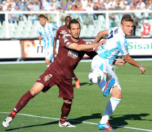 PESCARA, ITALY - MAY 12: Valerio Di Cesare of Torino and Ciro Immobile of Pescara in action during the Serie B match between Pescara Calcio and Torino FC at Adriatico Stadium on May 12, 2012 in Pescara, Italy. (Photo by Giuseppe Bellini/Getty Images) PESCARA, ITALY - MAY 12: Valerio Di Cesare of Torino and Ciro Immobile of Pescara in action during the Serie B match between Pescara Calcio and Torino FC at Adriatico Stadium on May 12, 2012 in Pescara, Italy. (Photo by Giuseppe Bellini/Getty Images)