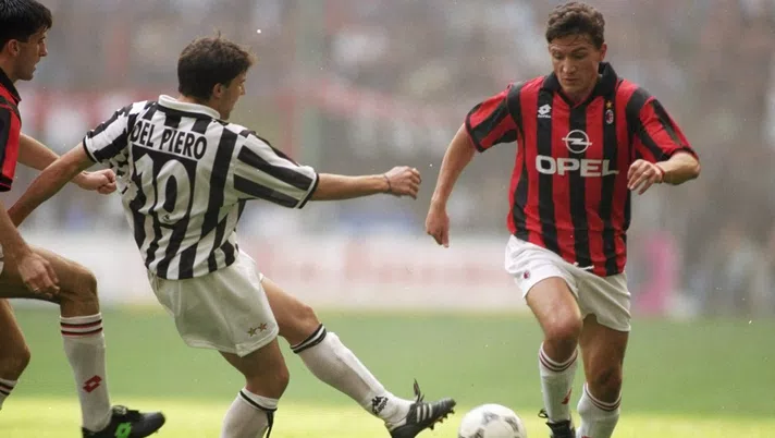 15 Oct 1995:  Stefano Eranio (right) of AC Milan takes on Alessandro del Piero of Juventus during a Series A match at the San Siro Stadium in Milan, Italy. AC Milan won the match 2-1.  Mandatory Credit: Ben  Radford/Allsport