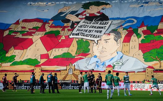 NUREMBERG, GERMANY - APRIL 21:  Fans of Nuernberg display a banner before the Bundesliga match between 1. FC Nuernberg and SpVgg Greuther Fuerth at Stadium Nuremberg on April 21, 2013 in Nuremberg, Germany.  (Photo by Lennart Preiss/Bongarts/Getty Images) 