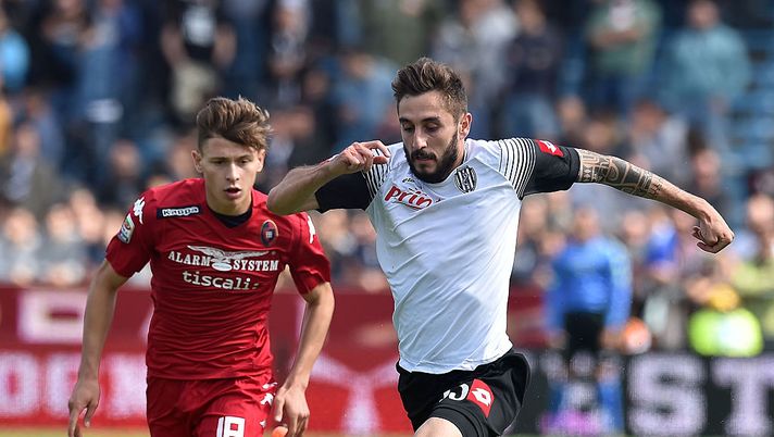 CESENA, ITALY - MAY 24:  Nicolo' Barella of Cagliari and Francesco Renzetti of Cesena in action during the Serie A match between AC Cesena and Cagliari Calcio at Dino Manuzzi Stadium on May 24, 2015 in Cesena, Italy.  (Photo by Giuseppe Bellini/Getty Images) 