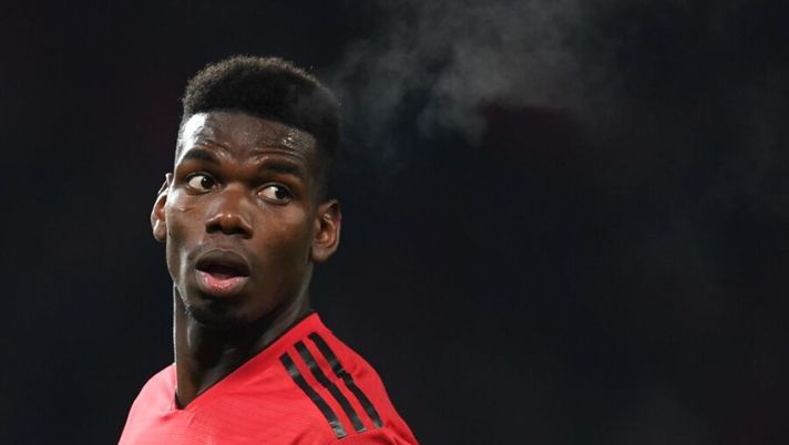 Manchester United's French midfielder Paul Pogba plays during the English Premier League football match between Manchester United and Burnley at Old Trafford in Manchester, north west England, on January 29, 2019. (Photo by Paul ELLIS / AFP) / RESTRICTED TO EDITORIAL USE. No use with unauthorized audio, video, data, fixture lists, club/league logos or 'live' services. Online in-match use limited to 120 images. An additional 40 images may be used in extra time. No video emulation. Social media in-match use limited to 120 images. An additional 40 images may be used in extra time. No use in betting publications, games or single club/league/player publications. / (Photo credit should read PAUL ELLIS/AFP/Getty Images) MERCATO – Pogba boom: “Pronto a cambiare club!”. Sorpresa Sanabria, De Paul, Suso…- immagine 1