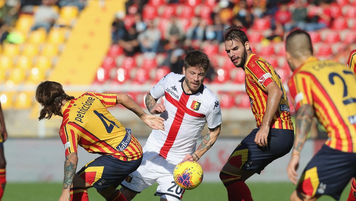 LECCE, ITALY - DECEMBER 08:  Jacopo Petriccione of Lecce competes for the ball with Lasse Schone of Genoa during the Serie A match between US Lecce and Genoa CFC at Stadio Via del Mare on December 8, 2019 in Lecce, Italy.  (Photo by Maurizio Lagana/Getty Images) 