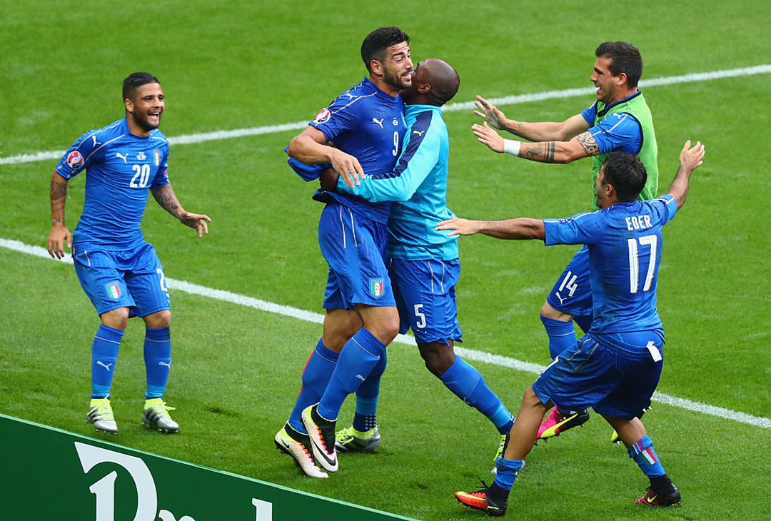  PARIS, FRANCE - JUNE 27:  Graziano Pelle (2nd L) of Italy celebrates scoring his team's second goal with his team mates during the UEFA EURO 2016 round of 16 match between Italy and Spain at Stade de France on June 27, 2016 in Paris, France.  (Photo by Clive Rose/Getty Images) 