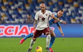  NAPLES, ITALY - FEBRUARY 29: Simone Zaza of Torino FC vies with Stanislav Lobotka of SSC Napoli during the Serie A match between SSC Napoli and Torino FC at Stadio San Paolo on February 29, 2020 in Naples, Italy. (Photo by Francesco Pecoraro/Getty Images)
