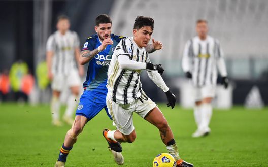 TURIN, ITALY - JANUARY 03: Paulo Dybala of Juventus F.C. runs with the ball under pressure from Rodrigo De Paul of Udinese Calcio during the Serie A match between Juventus and Udinese Calcio at Allianz Stadium on January 03, 2021 in Turin, Italy. Sporting stadiums around Italy remain under strict restrictions due to the Coronavirus Pandemic as Government social distancing laws prohibit fans inside venues resulting in games being played behind closed doors. (Photo by Valerio Pennicino/Getty Images) TURIN, ITALY - JANUARY 03: Paulo Dybala of Juventus F.C. runs with the ball under pressure from Rodrigo De Paul of Udinese Calcio during the Serie A match between Juventus and Udinese Calcio at Allianz Stadium on January 03, 2021 in Turin, Italy. Sporting stadiums around Italy remain under strict restrictions due to the Coronavirus Pandemic as Government social distancing laws prohibit fans inside venues resulting in games being played behind closed doors. (Photo by Valerio Pennicino/Getty Images)