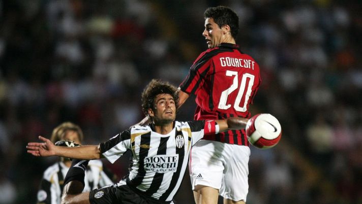 SIENA, ITALY - SEPTEMBER 15:  Simone Vergassola of Siena and Yoann Gourcuff of AC Milan (R) jump for the ball during the Serie A match between Siena and AC Milan at the Artemio Franchi on September 15, 2007 in Siena, Italy.  (Photo by NewPress/Getty Images) 