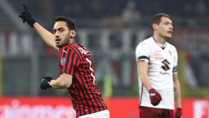 MILAN, ITALY - JANUARY 28:  Hakan Calhanoglu of AC Milan celebrates his goal during the Coppa Italia Quarter Final match between AC Milan and Torino at San Siro on January 28, 2020 in Milan, Italy.  (Photo by Marco Luzzani/Getty Images) 