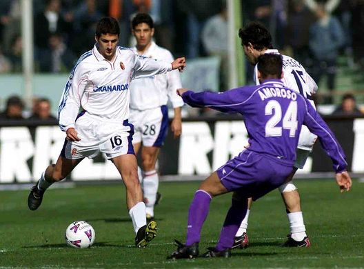 18 Mar 2001: Christian Amoroso of Fiorentina and Alessandro Gamberini of Bologna during the Serie A 23rd Round League match between Fiorentina and Bologna played at the Comunale stadium Florence Italy . DIGITAL CAMERA Mandatory Credit: Grazia Neri/ALLSPORT 18 Mar 2001: Christian Amoroso of Fiorentina and Alessandro Gamberini of Bologna during the Serie A 23rd Round League match between Fiorentina and Bologna played at the Comunale stadium Florence Italy . DIGITAL CAMERA Mandatory Credit: Grazia Neri/ALLSPORT