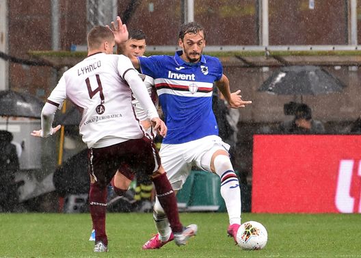 GENOA, ITALY - SEPTEMBER 22: Manolo Gabbiadini of UC Sampdoria and Lyanko of Torino FC during the Serie A match between UC Sampdoria and Torino FC at Stadio Luigi Ferraris on September 22, 2019 in Genoa, Italy. (Photo by Paolo Rattini/Getty Images) 