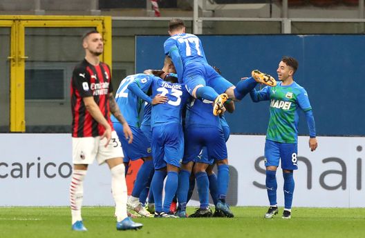 MILAN, ITALY - APRIL 21: Giacomo Raspadori of U.S. Sassuolo Calcio celebrates with team mates after scoring their sides second goal with team mates Domenico Berardi and Maxime Lopez during the Serie A match between AC Milan and US Sassuolo at Stadio Giuseppe Meazza on April 21, 2021 in Milan, Italy.Sporting stadiums around Italy remain under strict restrictions due to the Coronavirus Pandemic as Government social distancing laws prohibit fans inside venues resulting in games being played behind closed doors. (Photo by Marco Luzzani/Getty Images) MILAN, ITALY - APRIL 21: Giacomo Raspadori of U.S. Sassuolo Calcio celebrates with team mates after scoring their sides second goal with team mates Domenico Berardi and Maxime Lopez during the Serie A match between AC Milan and US Sassuolo at Stadio Giuseppe Meazza on April 21, 2021 in Milan, Italy.Sporting stadiums around Italy remain under strict restrictions due to the Coronavirus Pandemic as Government social distancing laws prohibit fans inside venues resulting in games being played behind closed doors. (Photo by Marco Luzzani/Getty Images)