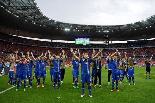 PARIS, FRANCE - JUNE 22: Aron Gunnarsson of Iceland applaud supporters after their team's 2-1 win in the UEFA EURO 2016 Group F match between Iceland and Austria at Stade de France on June 22, 2016 in Paris, France. (Photo by Shaun Botterill/Getty Images) PARIS, FRANCE - JUNE 22: Aron Gunnarsson of Iceland applaud supporters after their team's 2-1 win in the UEFA EURO 2016 Group F match between Iceland and Austria at Stade de France on June 22, 2016 in Paris, France. (Photo by Shaun Botterill/Getty Images)