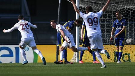 VERONA, ITALY - MAY 09:  Mergim Vojvoda of Torino FC  celebrates after scoring the opening goal during the Serie A match between Hellas Verona FC  and Torino FC at Stadio Marcantonio Bentegodi on May 09, 2021 in Verona, Italy. Sporting stadiums around Italy remain under strict restrictions due to the Coronavirus Pandemic as Government social distancing laws prohibit fans inside venues resulting in games being played behind closed doors. (Photo by Alessandro Sabattini/Getty Images)