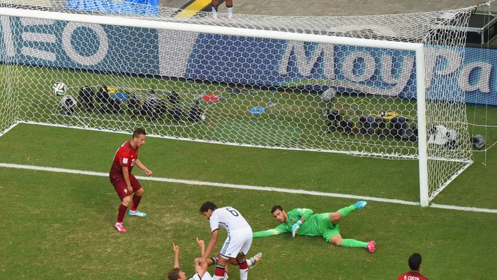 SALVADOR, BRAZIL - JUNE 16: Thomas Mueller of Germany scores his team's fourth goal and completes his hat trick past Rui Patricio of Portugal during the 2014 FIFA World Cup Brazil Group G match between Germany and Portugal at Arena Fonte Nova on June 16, 2014 in Salvador, Brazil. (Photo by Francois Xavier Marit - Pool/Getty Images) SALVADOR, BRAZIL - JUNE 16: Thomas Mueller of Germany scores his team's fourth goal and completes his hat trick past Rui Patricio of Portugal during the 2014 FIFA World Cup Brazil Group G match between Germany and Portugal at Arena Fonte Nova on June 16, 2014 in Salvador, Brazil. (Photo by Francois Xavier Marit - Pool/Getty Images)