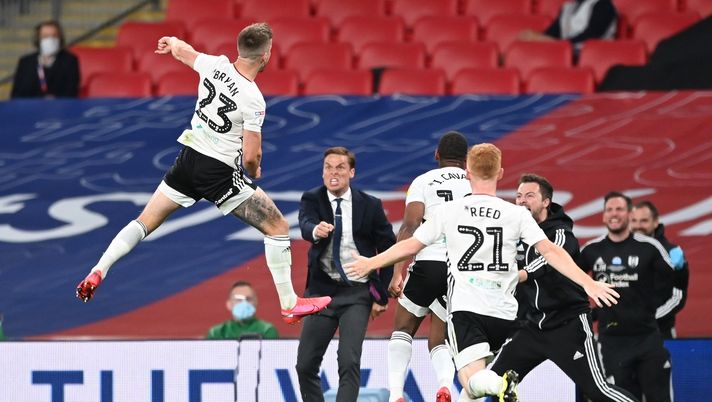 LONDON, ENGLAND - AUGUST 04: Joe Bryan of Fulham celebrates after scoring his sides first goal during the Sky Bet Championship Play Off Final match between Brentford and Fulham at Wembley Stadium on August 04, 2020 in London, England. Football Stadiums around Europe remain empty due to the Coronavirus Pandemic as Government social distancing laws prohibit fans inside venues resulting in all fixtures being played behind closed doors. (Photo by Shaun Botterill/Getty Images) LONDON, ENGLAND - AUGUST 04: Joe Bryan of Fulham celebrates after scoring his sides first goal during the Sky Bet Championship Play Off Final match between Brentford and Fulham at Wembley Stadium on August 04, 2020 in London, England. Football Stadiums around Europe remain empty due to the Coronavirus Pandemic as Government social distancing laws prohibit fans inside venues resulting in all fixtures being played behind closed doors. (Photo by Shaun Botterill/Getty Images)