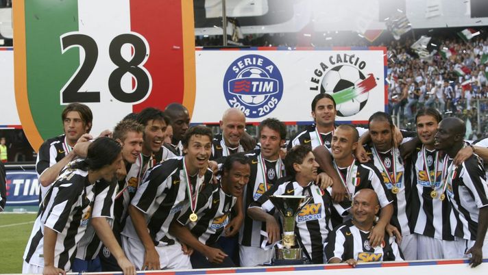 TURIN, ITALY - MAY 29: Juventus players celebrate with the trophy for the victory of "scudetto" at the end of the last Serie A football match of the season between Juventus and Cagliar at Delle Alpi Stadium on May 29, 2005 in Turin, Italy. Juventus won the Italina football championship for the 28th time. (Photo by Giuseppe Cacace/Getty Images) TURIN, ITALY - MAY 29: Juventus players celebrate with the trophy for the victory of "scudetto" at the end of the last Serie A football match of the season between Juventus and Cagliar at Delle Alpi Stadium on May 29, 2005 in Turin, Italy. Juventus won the Italina football championship for the 28th time. (Photo by Giuseppe Cacace/Getty Images)