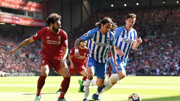 LIVERPOOL, ENGLAND - MAY 13: Lewis Dunk and Matias Ezequiel Schelotto of Brighton and Hove Albion are closed down by Mohamed Salah of Liverpool during the Premier League match between Liverpool and Brighton and Hove Albion at Anfield on May 13, 2018 in Liverpool, England. (Photo by Michael Regan/Getty Images) LIVERPOOL, ENGLAND - MAY 13: Lewis Dunk and Matias Ezequiel Schelotto of Brighton and Hove Albion are closed down by Mohamed Salah of Liverpool during the Premier League match between Liverpool and Brighton and Hove Albion at Anfield on May 13, 2018 in Liverpool, England. (Photo by Michael Regan/Getty Images)