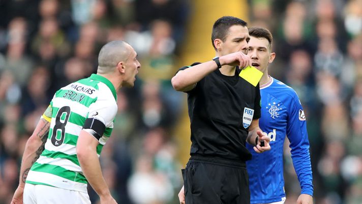 GLASGOW, SCOTLAND - DECEMBER 29: Celtic captain Scott Brown is shown a yellow card during the Ladbrokes Premiership match between Celtic and Rangers at Celtic Park on December 29, 2019 in Glasgow, Scotland. (Photo by Ian MacNicol/Getty Images) 