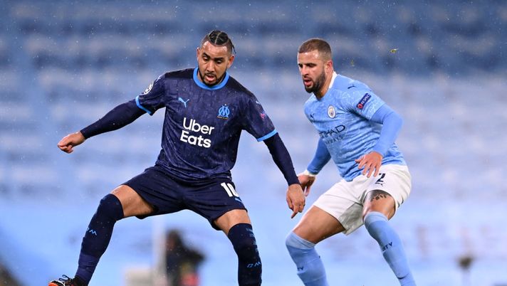 MANCHESTER, ENGLAND - DECEMBER 09: Dimitri Payet of Olympique de Marseille is challenged by Kyle Walker of Manchester City during the UEFA Champions League Group C stage match between Manchester City and Olympique de Marseille at Etihad Stadium on December 09, 2020 in Manchester, England. The match will be played without fans, behind closed doors as a Covid-19 precaution. (Photo by Laurence Griffiths/Getty Images) MANCHESTER, ENGLAND - DECEMBER 09: Dimitri Payet of Olympique de Marseille is challenged by Kyle Walker of Manchester City during the UEFA Champions League Group C stage match between Manchester City and Olympique de Marseille at Etihad Stadium on December 09, 2020 in Manchester, England. The match will be played without fans, behind closed doors as a Covid-19 precaution. (Photo by Laurence Griffiths/Getty Images)