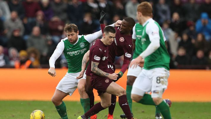EDINBURGH, SCOTLAND - FEBRUARY 12: Esmael Goncalves of Heart of Middlothian vies with Grant Holt of Hibernian during the Scottish Cup Fifth Round match between Heart of Midlothian and Hibernian at Tynecastle Stadium on February 12, 2017 in Edinburgh, Scotland. (Photo by Ian MacNicol/Getty Images) EDINBURGH, SCOTLAND - FEBRUARY 12: Esmael Goncalves of Heart of Middlothian vies with Grant Holt of Hibernian during the Scottish Cup Fifth Round match between Heart of Midlothian and Hibernian at Tynecastle Stadium on February 12, 2017 in Edinburgh, Scotland. (Photo by Ian MacNicol/Getty Images)