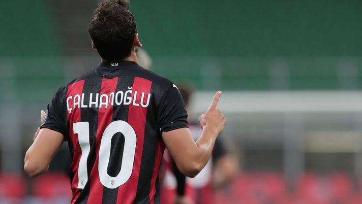 MILAN, ITALY - SEPTEMBER 24: Hakan Calhanoglu of AC Milan celebrates his second goal during the UEFA Europa League third qualifying round match between AC Milan and Bodo Glimt at Stadio Giuseppe Meazza on September 24, 2020 in Milan, Italy. (Photo by Emilio Andreoli/Getty Images) MILAN, ITALY - SEPTEMBER 24: Hakan Calhanoglu of AC Milan celebrates his second goal during the UEFA Europa League third qualifying round match between AC Milan and Bodo Glimt at Stadio Giuseppe Meazza on September 24, 2020 in Milan, Italy. (Photo by Emilio Andreoli/Getty Images)