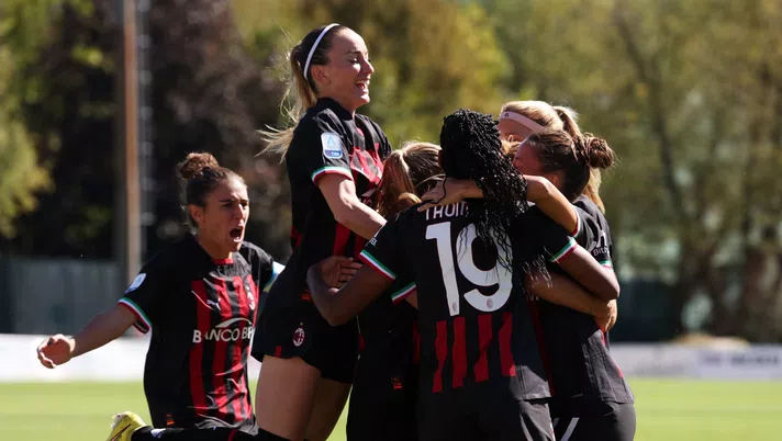 MILAN, ITALY - SEPTEMBER 18: Valery Vigilucci of AC Milan celebrates with teammates after scoring their team's first goal during the Women Serie A match between AC Milan and US Sassuolo at Centro Sportivo Vismara on September 18, 2022 in Milan, Italy. (Photo by AC Milan/AC Milan)
