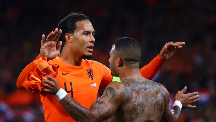 ROTTERDAM, NETHERLANDS - OCTOBER 10: Memphis Depay (R) of Netherlands celebrates scoring his teams third goal of the game with Virgil van Dijk during the UEFA Euro 2020 qualifier between Netherlands and Northern Ireland on October 10, 2019 in Rotterdam, Netherlands. (Photo by Dean Mouhtaropoulos/Getty Images,) ROTTERDAM, NETHERLANDS - OCTOBER 10: Memphis Depay (R) of Netherlands celebrates scoring his teams third goal of the game with Virgil van Dijk during the UEFA Euro 2020 qualifier between Netherlands and Northern Ireland on October 10, 2019 in Rotterdam, Netherlands. (Photo by Dean Mouhtaropoulos/Getty Images,)