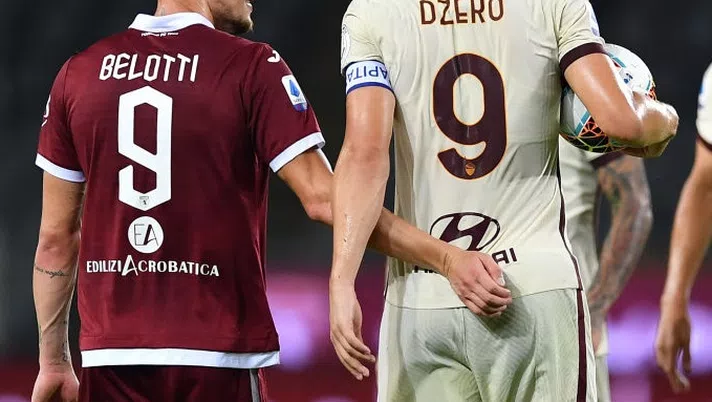 TURIN, ITALY - JULY 29:  Edin Dzeko of AS Roma salutes Andrea Belotti of AS Roma at the end of the Serie A match between Torino FC and  AS Roma at Stadio Olimpico di Torino on July 29, 2020 in Turin, Italy.  (Photo by Valerio Pennicino/Getty Images)