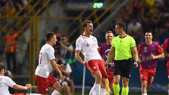 BOLOGNA, ITALY - JUNE 19: Krystian Bielik of Poland celebrates after scoring the opening goal during the 2019 UEFA U-21 Group A match between Italy and Poland at Renato Dall'Ara Stadium on June 19, 2019 in Bologna, Italy. (Photo by Claudio Villa/Getty Images) BOLOGNA, ITALY - JUNE 19: Krystian Bielik of Poland celebrates after scoring the opening goal during the 2019 UEFA U-21 Group A match between Italy and Poland at Renato Dall'Ara Stadium on June 19, 2019 in Bologna, Italy. (Photo by Claudio Villa/Getty Images)