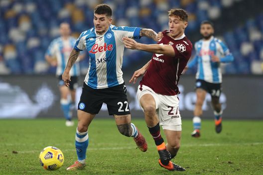 NAPLES, ITALY - DECEMBER 23: Giovanni Di Lorenzo of SSC Napoli battles for possession with Mergim Vojvoda of Torino during the Serie A match between SSC Napoli and Torino FC at Stadio Diego Armando Maradona on December 23, 2020 in Naples, Italy. Sporting stadiums around Italy remain under strict restrictions due to the Coronavirus Pandemic as Government social distancing laws prohibit fans inside venues resulting in games being played behind closed doors. (Photo by Francesco Pecoraro/Getty Images) NAPLES, ITALY - DECEMBER 23: Giovanni Di Lorenzo of SSC Napoli battles for possession with Mergim Vojvoda of Torino during the Serie A match between SSC Napoli and Torino FC at Stadio Diego Armando Maradona on December 23, 2020 in Naples, Italy. Sporting stadiums around Italy remain under strict restrictions due to the Coronavirus Pandemic as Government social distancing laws prohibit fans inside venues resulting in games being played behind closed doors. (Photo by Francesco Pecoraro/Getty Images)