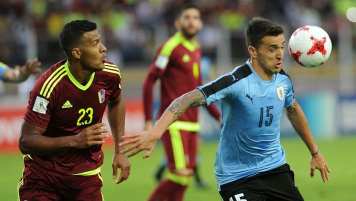 Uruguay's Matias Vecino (R) is marked by Venezuela's Salomon Rondon during their 2018 World Cup qualifier football match in San Cristobal, Venezuela, on October 5, 2017. / AFP PHOTO / GEORGE CASTELLANOS (Photo credit should read GEORGE CASTELLANOS/AFP/Getty Images) Uruguay's Matias Vecino (R) is marked by Venezuela's Salomon Rondon during their 2018 World Cup qualifier football match in San Cristobal, Venezuela, on October 5, 2017. / AFP PHOTO / GEORGE CASTELLANOS (Photo credit should read GEORGE CASTELLANOS/AFP/Getty Images)