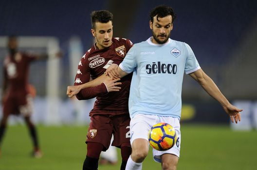 ROME, ROMA - DECEMBER 11: Marco Parolo of SS Lazio competes for the ball with Alejandro Berengur of Torino FC during the Serie A match between SS Lazio and Torino FC at Stadio Olimpico on December 11, 2017 in Rome, Italy. (Photo by Marco Rosi/Getty Images) ROME, ROMA - DECEMBER 11: Marco Parolo of SS Lazio competes for the ball with Alejandro Berengur of Torino FC during the Serie A match between SS Lazio and Torino FC at Stadio Olimpico on December 11, 2017 in Rome, Italy. (Photo by Marco Rosi/Getty Images)