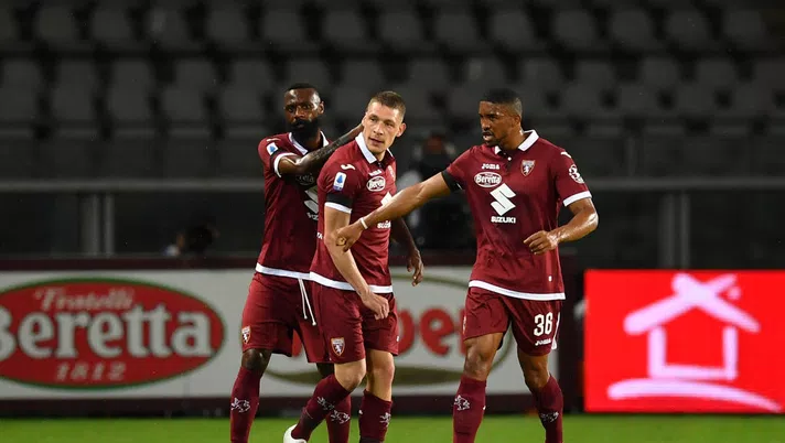 TURIN, ITALY - JUNE 23:  Andrea Belotti (C) of Torino FC celebrates the opening goal with team mates Nicolas Nkoulou (L) and Gleison Bremer during the Serie A match between Torino FC and  Udinese Calcio at Stadio Olimpico di Torino on June 23, 2020 in Turin, Italy.  (Photo by Valerio Pennicino/Getty Images)