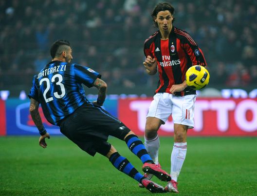MILAN, ITALY - NOVEMBER 14: Marco Materazzi of FC Internazionale Milano clashes with Zlatan Ibrahimovic of AC Milan during the Serie A match between FC Internazionale Milano and AC Milan at Stadio Giuseppe Meazza on November 14, 2010 in Milan, Italy. (Photo by Valerio Pennicino/Getty Images) MILAN, ITALY - NOVEMBER 14: Marco Materazzi of FC Internazionale Milano clashes with Zlatan Ibrahimovic of AC Milan during the Serie A match between FC Internazionale Milano and AC Milan at Stadio Giuseppe Meazza on November 14, 2010 in Milan, Italy. (Photo by Valerio Pennicino/Getty Images)