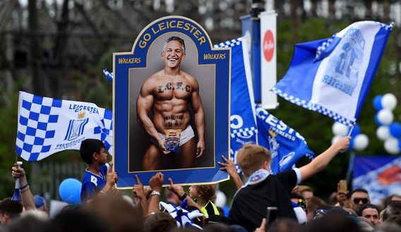 LEICESTER, ENGLAND - MAY 07: Leicester fans hold a poster displaying the image of former Leicester footballer Gary Lineker in his underwear, in relation to the TV presenter's promise to present Match of the Day in his underwear if Leicester won the Premier League title, outside the stadium before the Barclays Premier League match between Leicester City and Everton at The King Power Stadium on May 7, 2016 in Leicester, United Kingdom. (Photo by Shaun Botterill/Getty Images) LEICESTER, ENGLAND - MAY 07: Leicester fans hold a poster displaying the image of former Leicester footballer Gary Lineker in his underwear, in relation to the TV presenter's promise to present Match of the Day in his underwear if Leicester won the Premier League title, outside the stadium before the Barclays Premier League match between Leicester City and Everton at The King Power Stadium on May 7, 2016 in Leicester, United Kingdom. (Photo by Shaun Botterill/Getty Images)