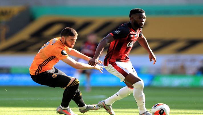 WOLVERHAMPTON, ENGLAND - JUNE 24: Jefferson Lerma of AFC Bournemouth controls the ball as Matt Doherty of Wolverhampton Wanderers looks on during the Premier League match between Wolverhampton Wanderers and AFC Bournemouth at Molineux on June 24, 2020 in Wolverhampton, England. (Photo by Mike Egerton/Pool via Getty Images) WOLVERHAMPTON, ENGLAND - JUNE 24: Jefferson Lerma of AFC Bournemouth controls the ball as Matt Doherty of Wolverhampton Wanderers looks on during the Premier League match between Wolverhampton Wanderers and AFC Bournemouth at Molineux on June 24, 2020 in Wolverhampton, England. (Photo by Mike Egerton/Pool via Getty Images)