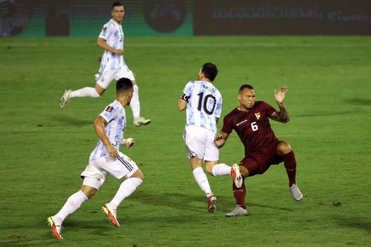 CARACAS, VENEZUELA - SEPTEMBER 02: Lionel Messi of Argentina reacts is fouled by Luis Martinez of Venezuela during a match between Venezuela and Argentina as part of South American Qualifiers for Qatar 2022 at Estadio Olimpico on September 02, 2021 in Caracas, Venezuela. (Photo by Miguel Gutiérrez-Pool/Getty Images) CARACAS, VENEZUELA - SEPTEMBER 02: Lionel Messi of Argentina reacts is fouled by Luis Martinez of Venezuela during a match between Venezuela and Argentina as part of South American Qualifiers for Qatar 2022 at Estadio Olimpico on September 02, 2021 in Caracas, Venezuela. (Photo by Miguel Gutiérrez-Pool/Getty Images)