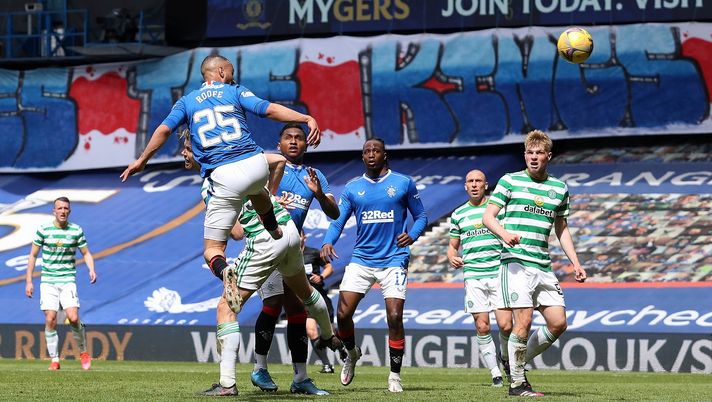 GLASGOW, SCOTLAND - MAY 02: Kemar Roofe of Rangers scores their team's third goal during the Ladbrokes Scottish Premiership match between Rangers and Celtic at Ibrox Stadium on May 02, 2021 in Glasgow, Scotland. Sporting stadiums around the UK remain under strict restrictions due to the Coronavirus Pandemic as Government social distancing laws prohibit fans inside venues resulting in games being played behind closed doors. (Photo by Ian MacNicol/Getty Images) GLASGOW, SCOTLAND - MAY 02: Kemar Roofe of Rangers scores their team's third goal during the Ladbrokes Scottish Premiership match between Rangers and Celtic at Ibrox Stadium on May 02, 2021 in Glasgow, Scotland. Sporting stadiums around the UK remain under strict restrictions due to the Coronavirus Pandemic as Government social distancing laws prohibit fans inside venues resulting in games being played behind closed doors. (Photo by Ian MacNicol/Getty Images)