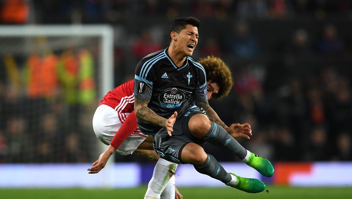 MANCHESTER, ENGLAND - MAY 11: Pablo Hernandez of Celta Vigo is tackled by Marouane Fellaini of Manchester United during the UEFA Europa League, semi final second leg match, between Manchester United and Celta Vigo at Old Trafford on May 11, 2017 in Manchester, United Kingdom. (Photo by Gareth Copley/Getty Images) MANCHESTER, ENGLAND - MAY 11: Pablo Hernandez of Celta Vigo is tackled by Marouane Fellaini of Manchester United during the UEFA Europa League, semi final second leg match, between Manchester United and Celta Vigo at Old Trafford on May 11, 2017 in Manchester, United Kingdom. (Photo by Gareth Copley/Getty Images)