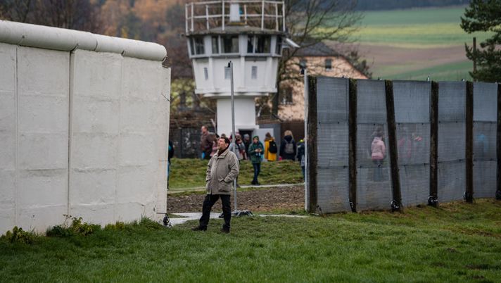 MOEDLAREUTH, GERMANY - NOVEMBER 09: The wall of the former GDR border guard forces at a former fortified border crossing between East and West Germany during celebrations to mark the 30th anniversary of the fall of the Berlin Wall on November 9, 2019 in Moedlareuth, Germany. East Germanys communist authorities established a security zone along the border to West Germany beginning in 1954 with the principal aim of preventing people fleeing from East Germany to West Germany. In 1961 they also built the Berlin Wall around West Berlin, which existed as a West German exclave under Allied occupation in East Germany. The opening of the Berlin Wall as well as the border between East and West Germany in 1989 quickly led to the collapse of the East German communist government and the eventual reunification of Germany in 1991. (Photo by Jens Schlueter/Getty Images) MOEDLAREUTH, GERMANY - NOVEMBER 09: The wall of the former GDR border guard forces at a former fortified border crossing between East and West Germany during celebrations to mark the 30th anniversary of the fall of the Berlin Wall on November 9, 2019 in Moedlareuth, Germany. East Germanys communist authorities established a security zone along the border to West Germany beginning in 1954 with the principal aim of preventing people fleeing from East Germany to West Germany. In 1961 they also built the Berlin Wall around West Berlin, which existed as a West German exclave under Allied occupation in East Germany. The opening of the Berlin Wall as well as the border between East and West Germany in 1989 quickly led to the collapse of the East German communist government and the eventual reunification of Germany in 1991. (Photo by Jens Schlueter/Getty Images)